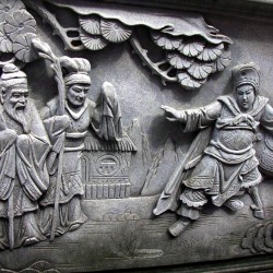 Stone carving depicting a scene of an ancient story